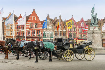 Bicycles against buildings in city