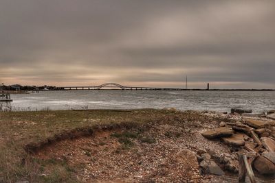 Scenic view of sea against cloudy sky