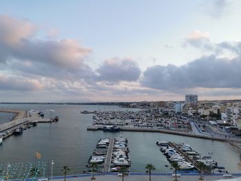 High angle view of sailboats in sea against sky