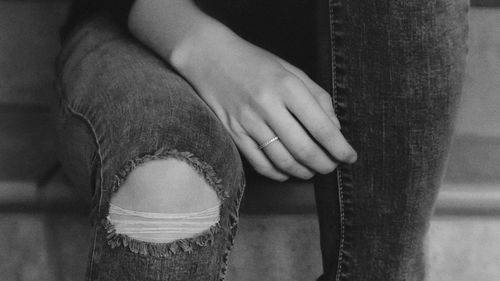 Cropped image of woman looking away