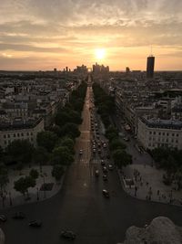 High angle view of city buildings during sunset