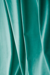 Detail shot of blue curtain