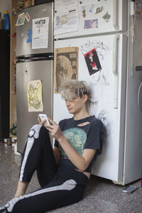 Young woman hanging out in her apartment