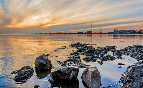 Scenic view of sea against sky during sunset