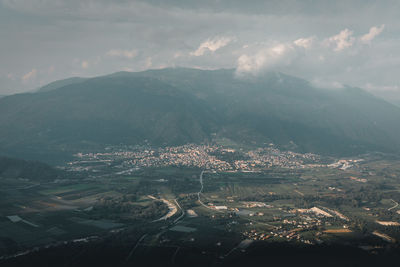 Aerial view of townscape against sky