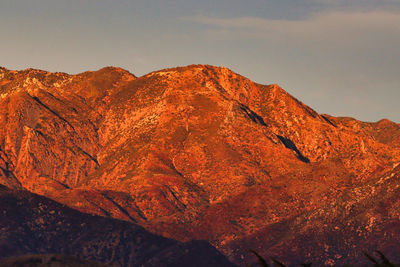 Low angle view of rock formation against sky