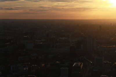 High angle view of buildings against sky during sunset