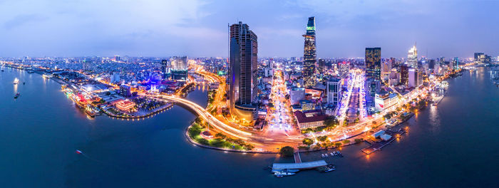 Aerial view of illuminated city at night