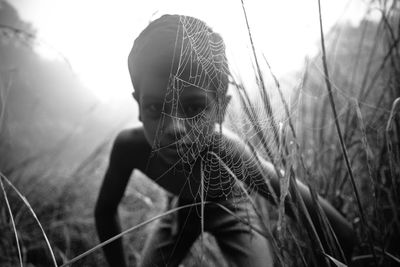 Portrait of boy on field