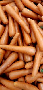 Full frame shot of carrots for sale in market