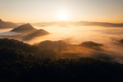 Scenic view of mountains against sky during sunset