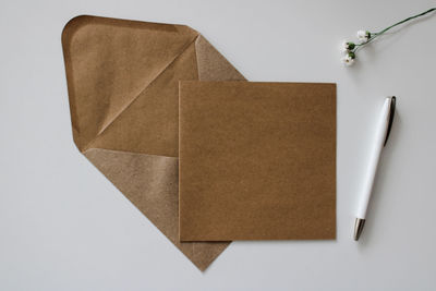 High angle view of blank paper on white background