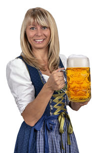 Portrait of smiling woman holding beer over white background