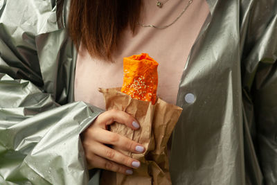 Burrito in woman hand