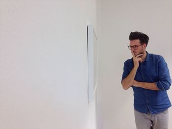 Man looking at whiteboard