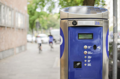 Close up of ticket machine at sidewalk