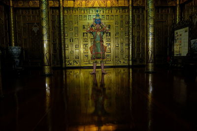 Reflection of text on building in temple