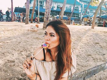 Portrait of young woman on beach