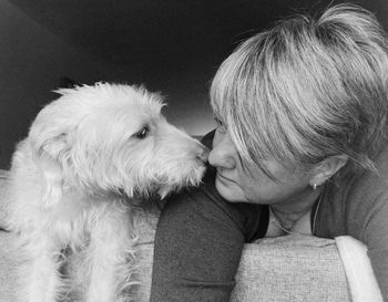 Rear view of woman with dog