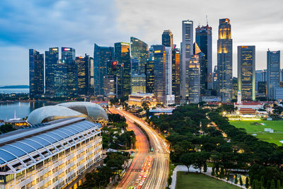 High angle view of road amidst buildings in city against sky