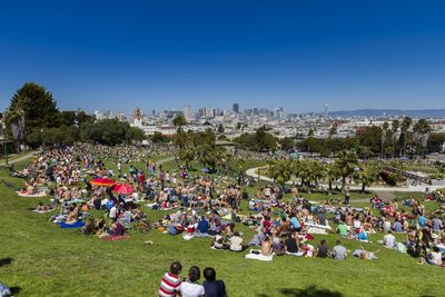 People on grassy field