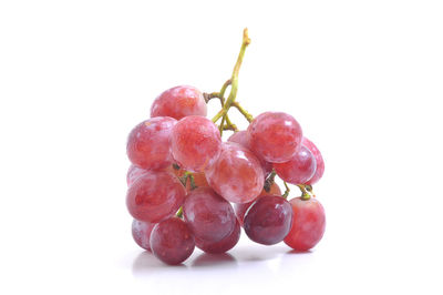 Close-up of raspberries against white background