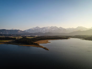 Scenic view of lake against clear sky