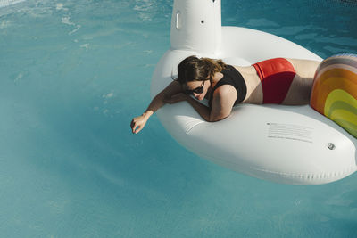 High angle view of man swimming in pool