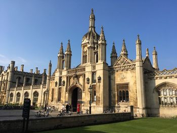 Facade of historic building against clear sky