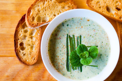 Directly above shot of soup in bowl on table