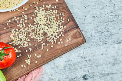 High angle view of chopped bread on cutting board