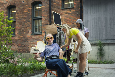 Young people at yard sale