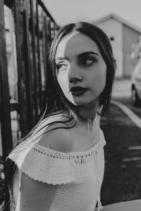 Close-up of young woman standing outdoors