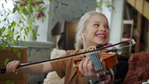 Young woman playing violin