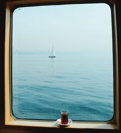 Sailboat sailing in sea