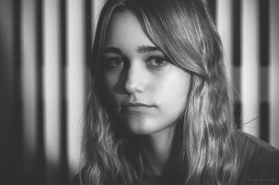 Close-up of young woman at home