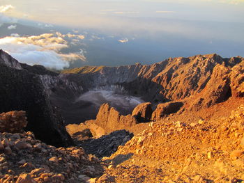 Sunrise at the top of mount rinjani, lombok, indonesia. view of crater lake from the summit.