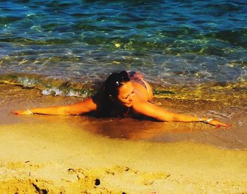 People relaxing on shore