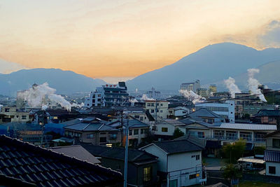 High angle view of townscape against sky during sunset