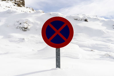 Information sign on road during winter