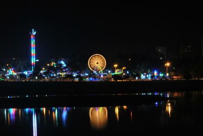 Reflection of illuminated buildings in water