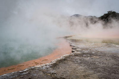 Smoke emitting from volcanic mountain