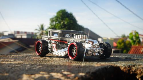 Vintage car on road against sky