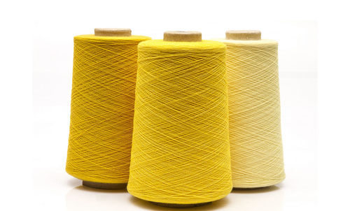 Close-up of yellow painted over white background