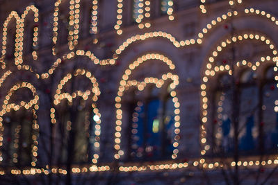 Low angle view of illuminated building at night