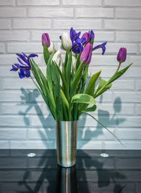 Close-up of tulips in vase on table