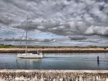 View of river against cloudy sky