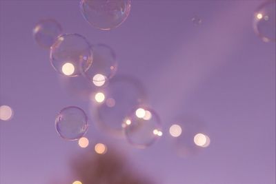 Close-up of bubbles in dark background