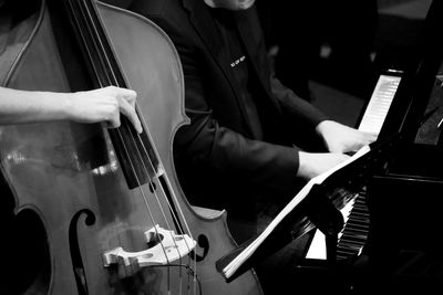 Musicians playing cello and piano