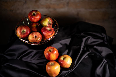 High angle view of apples in bowl on table